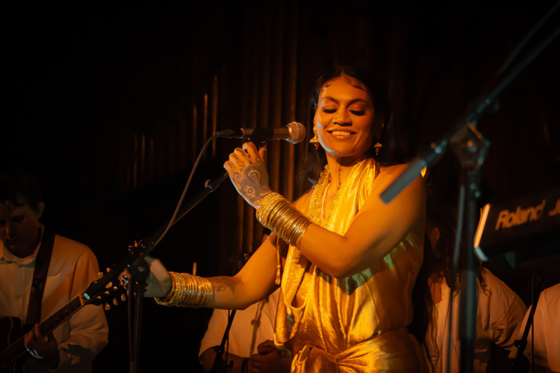  Aaradhna smiles onstage at Old St Paul's.