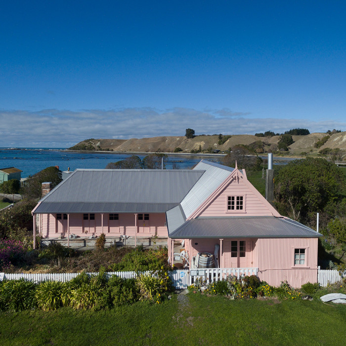 Aerial view of Fyffe House with the ocean in the backyard