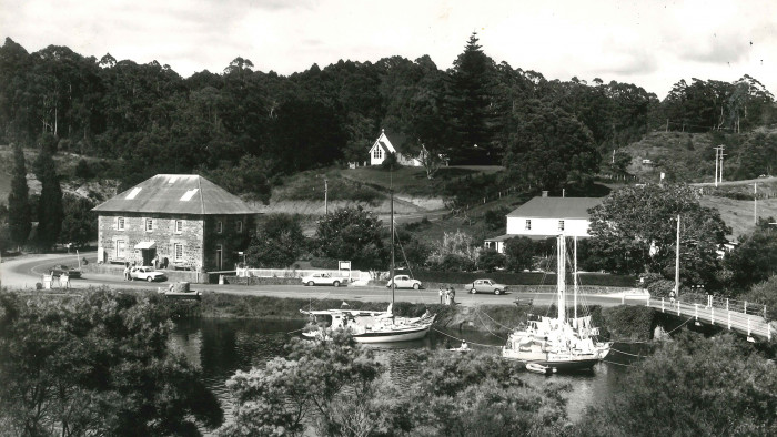 Kerikeri Mission Station showing the Stone Store and Kemp House with the old road and bridge
