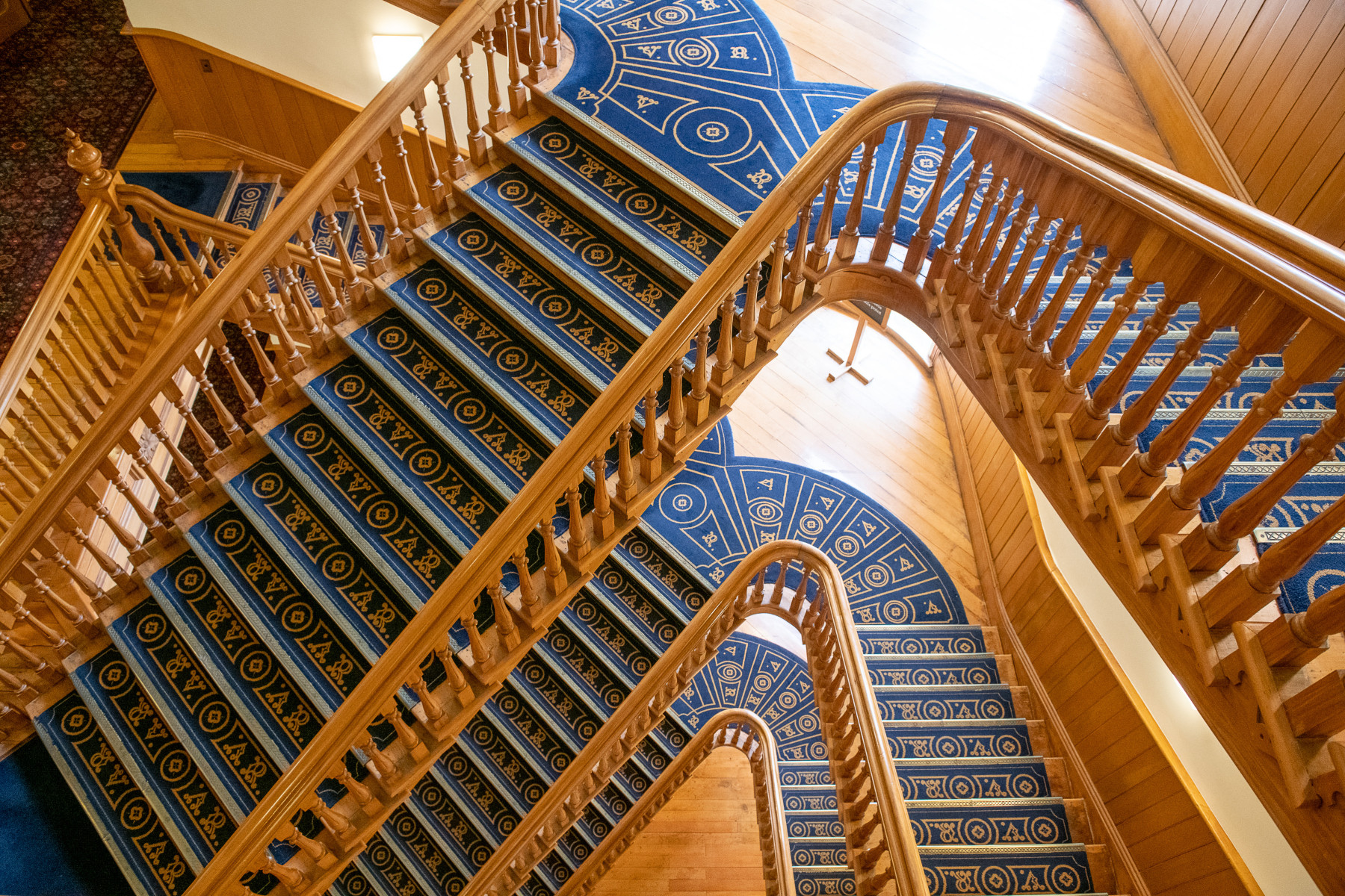 A maze of wooden staircases inside Old Government Buildings.