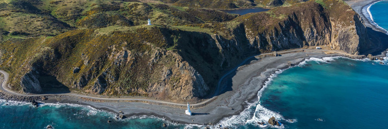 Aerial shot of Pencarrow Head with old Pencarrow Lighthouse on the hill, above new Pencarrow Head Lighthouse below